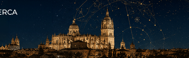 Catedral de Salamanca iluminada bajo un cielo estrellado con constelaciones doradas